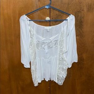 White woman’s 1x top.